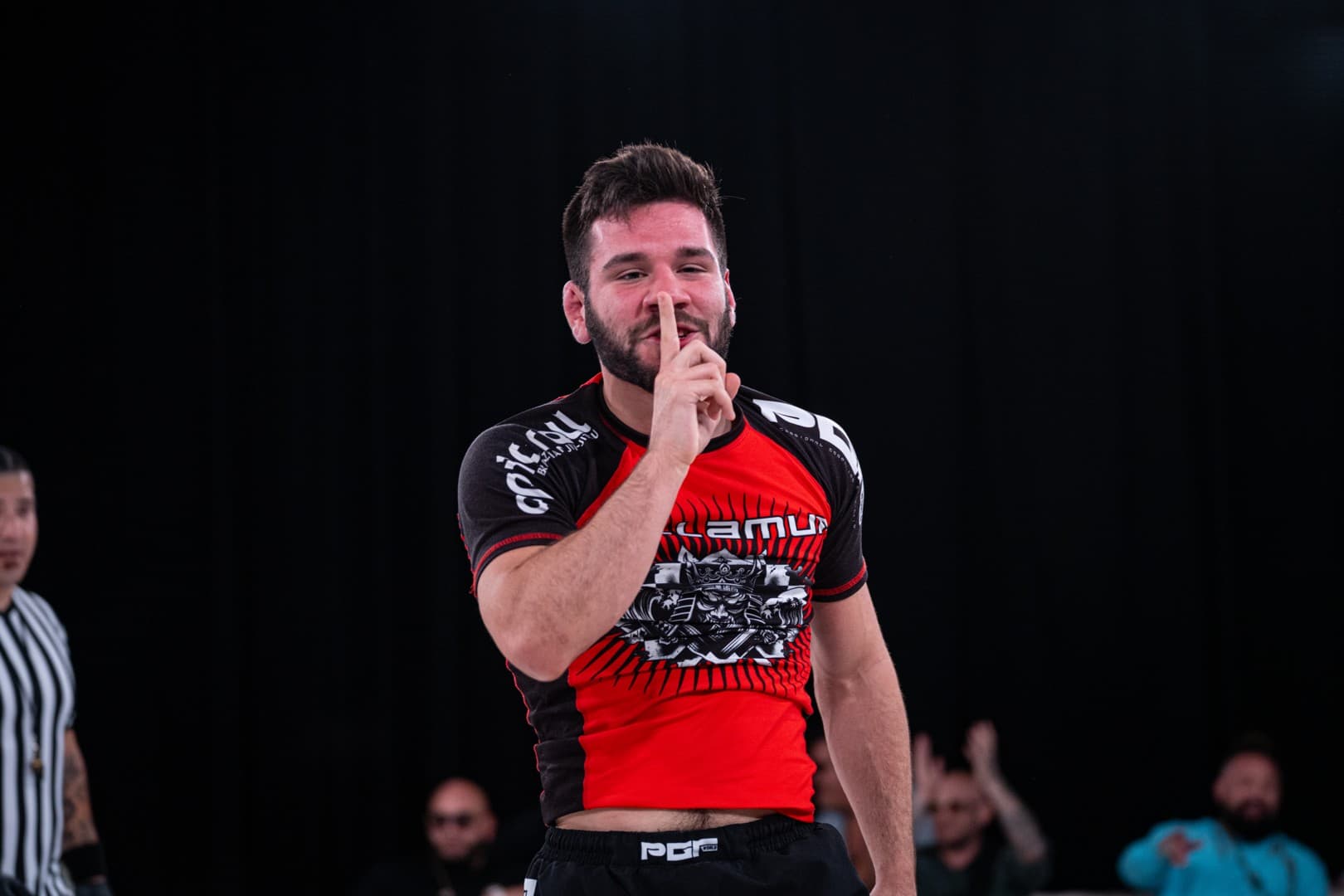 Team Dollamur raising the Season 8 trophy.