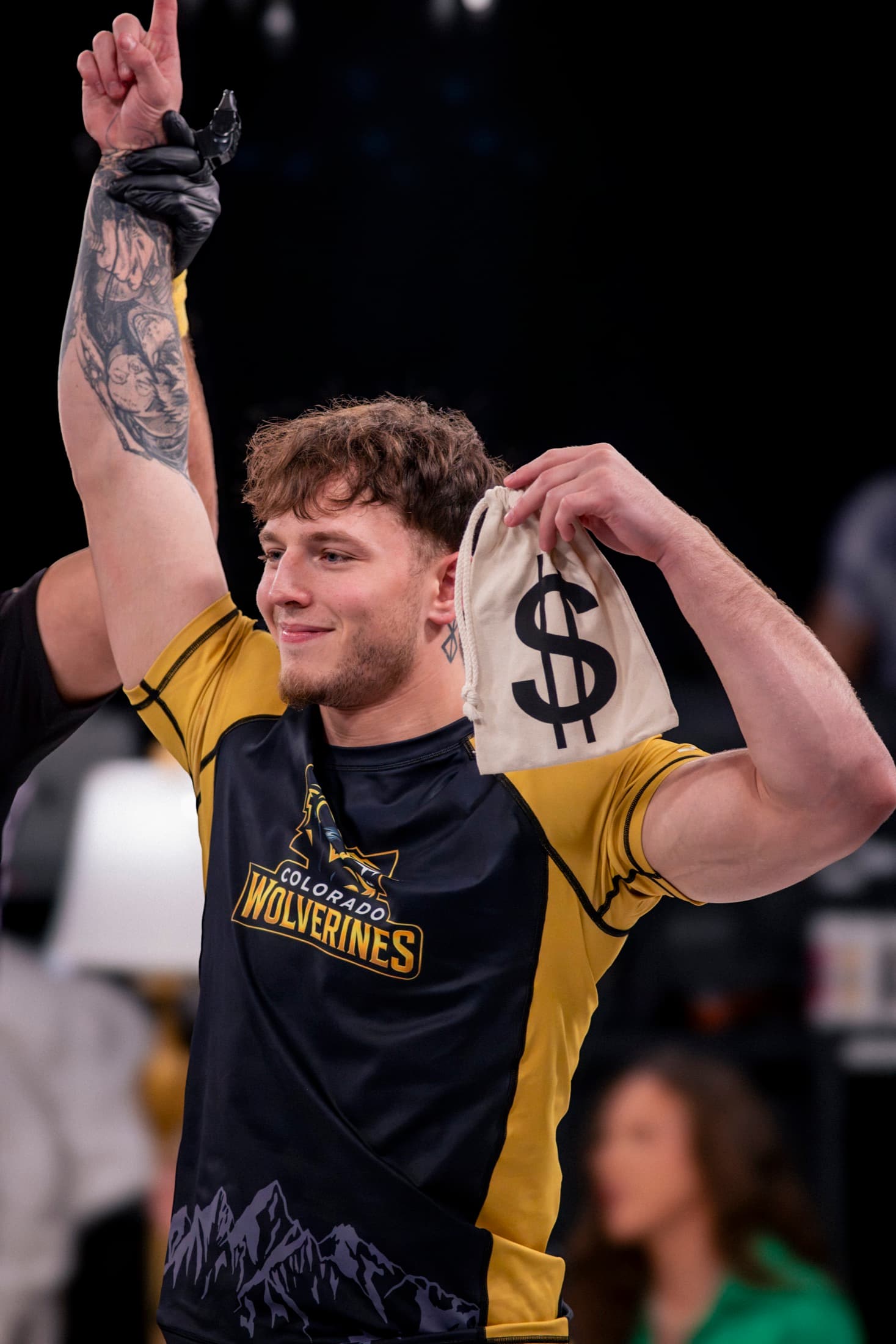 Jayden Groner celebrates his Week 4 breakout for the Colorado Wolverines while holding a money bag.